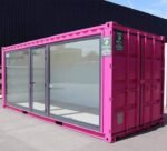Różowy kontener biurowy o długości 20 stóp